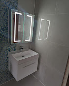 Designer bathroom renovation in Bexley with marble-effect tiles and contemporary fixtures