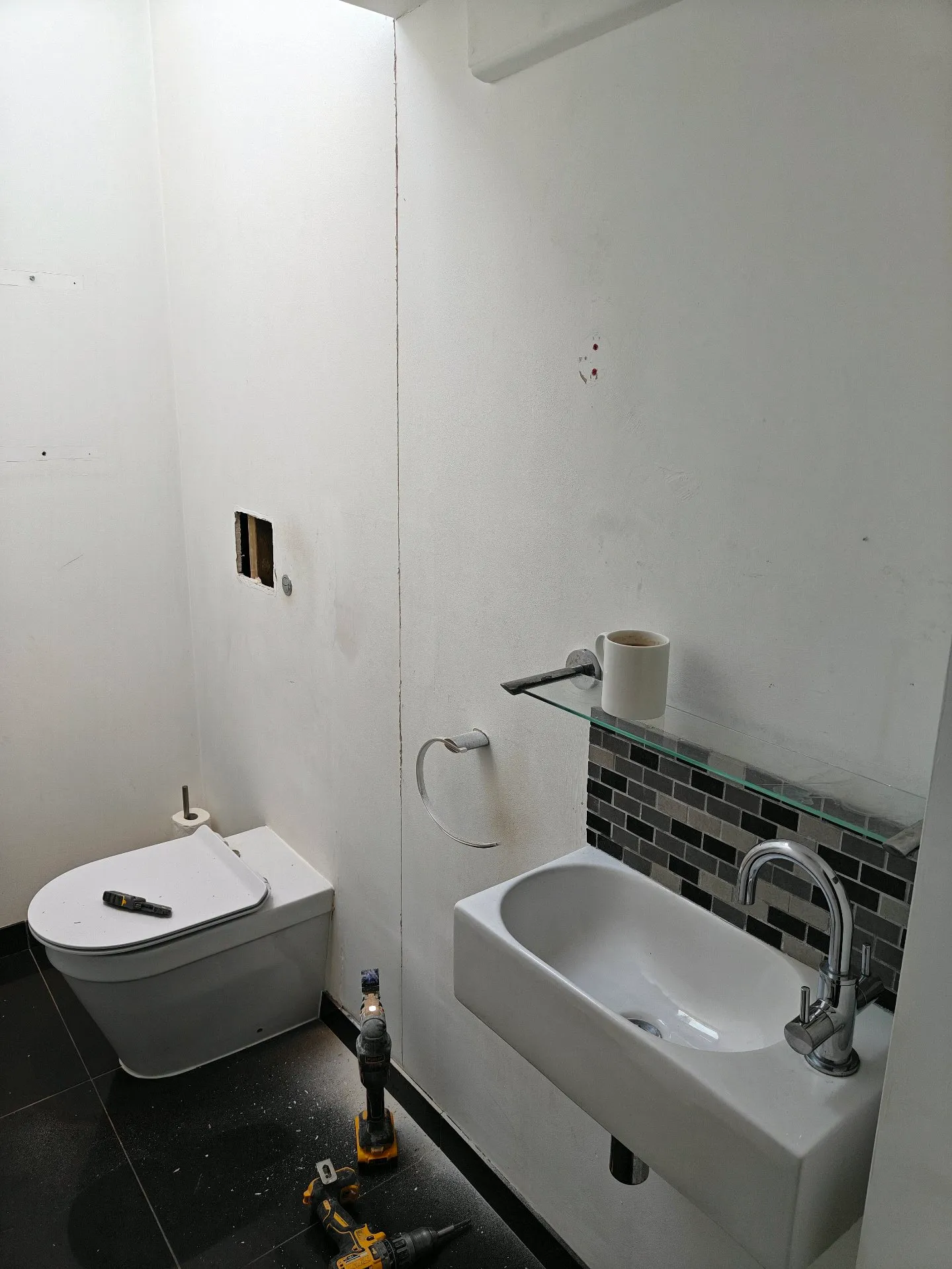 During: Cloakroom renovation in Kent mid-fit with new pipework and units going in